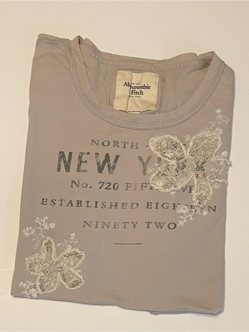 Abercrombie & Fitch Light Grey Graphic Tee with Cream Lace Appliqué